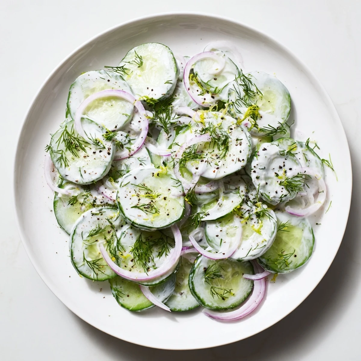 Cold Cucumber-Dill Salad with Yogurt: a refreshing vegetarian side, ready in minutes with a creamy yogurt dressing.