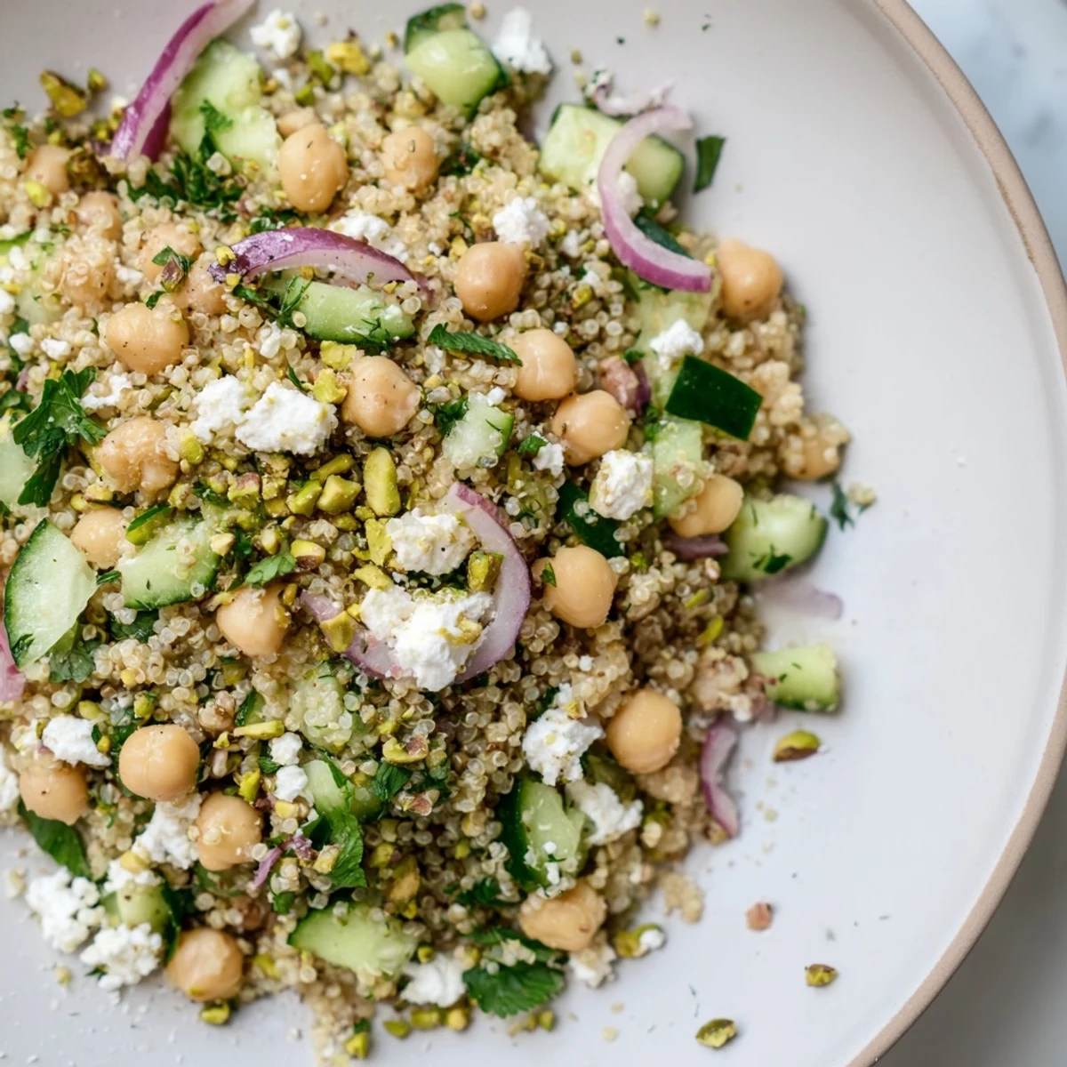 Jennifer Aniston Salad: A colorful mix of quinoa, feta, and fresh herbs, perfect for a light lunch.