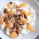Luscious Elevated Ambrosia Salad, showcasing fluffy marshmallows and toasted pecans, chilled for the perfect dessert.