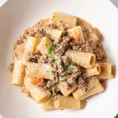 This comforting Chaos Cooking Kimchi Ragu Pasta shows off rich, spicy flavors, perfect for dinner tonight.